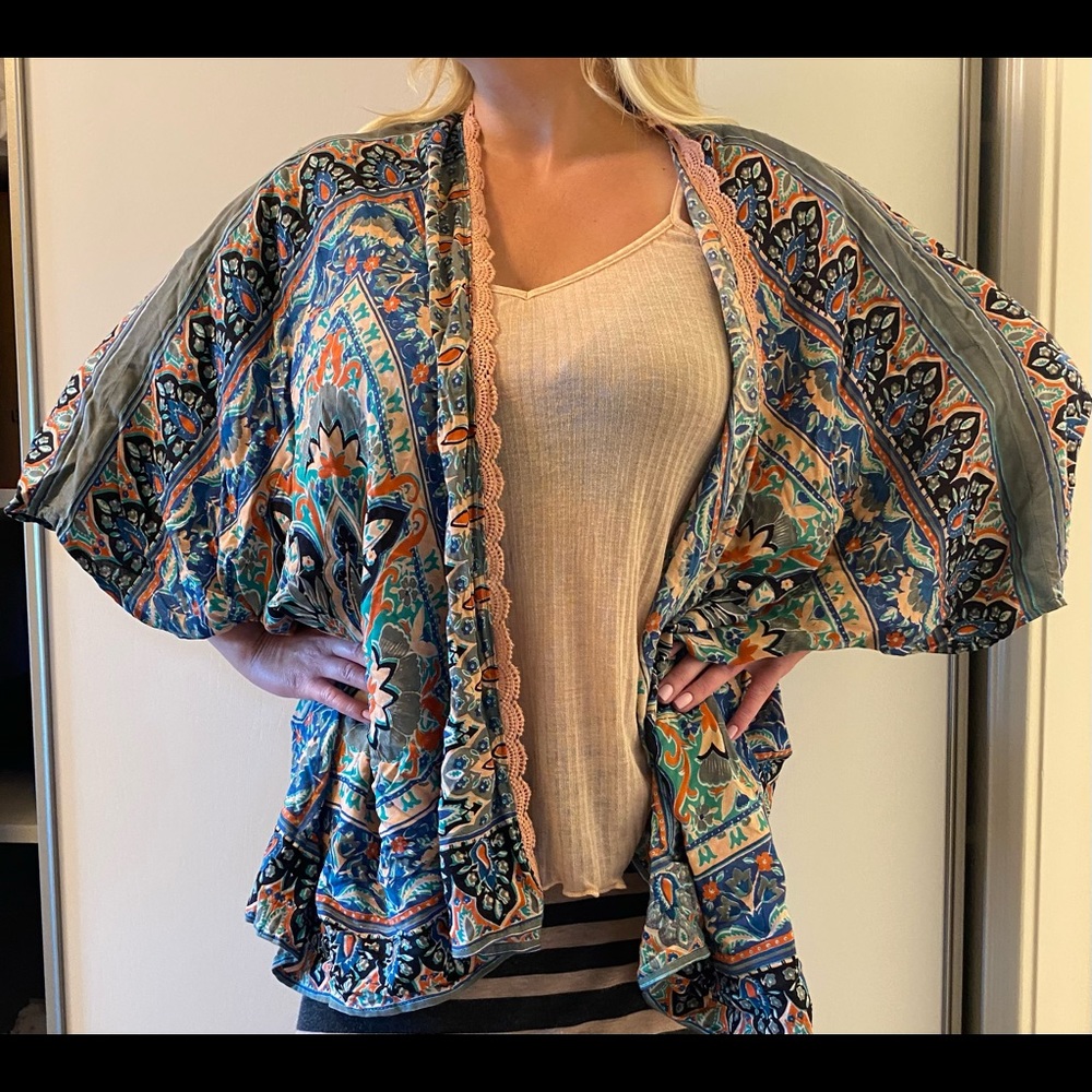 Two in one versatile shirt/wrap/strap tank